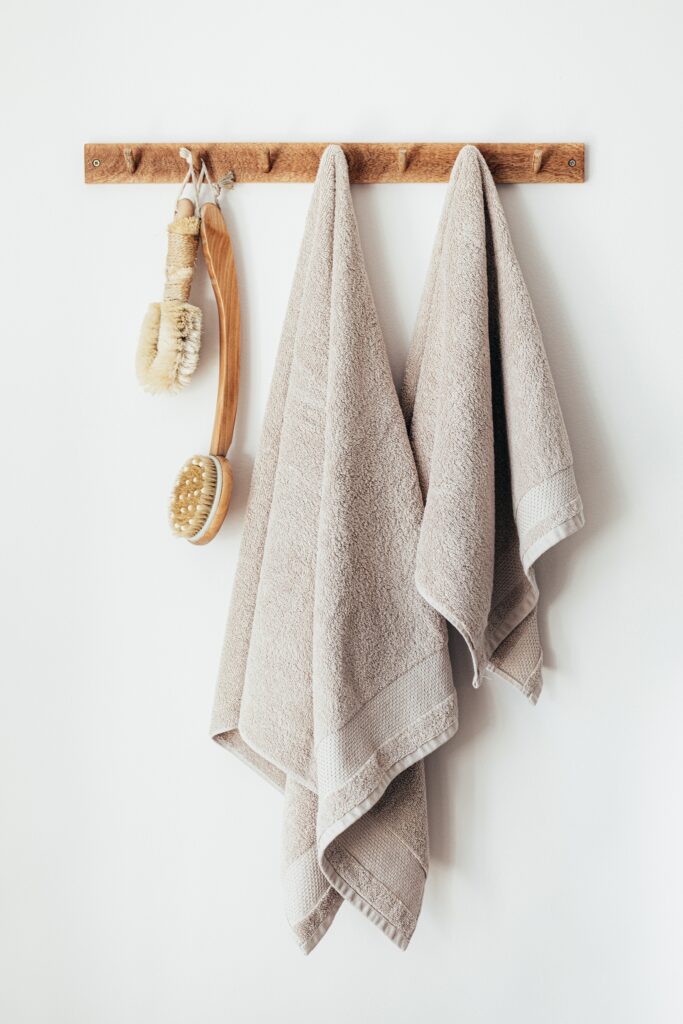 Neat towels hung up on pegs