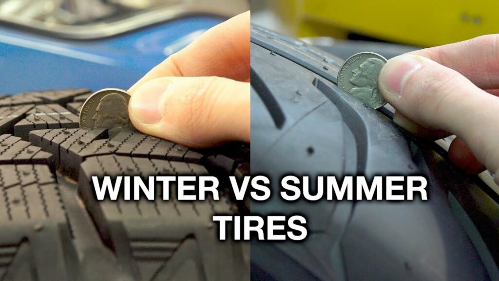 illustrating the tyre depth on on a winter tyre vs summer tyre with a coin