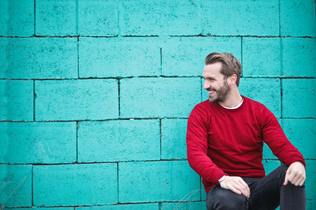 White male in red jumper