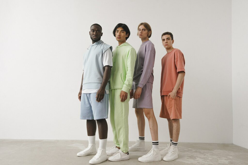 4 males wearing different colour clothing