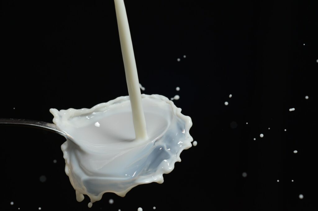 Milk poured on to a spoon