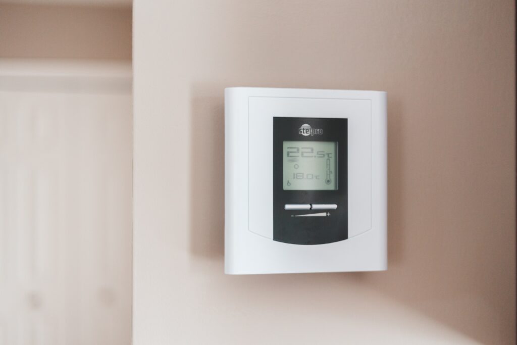 Thermostat on the wall of an interior wall
