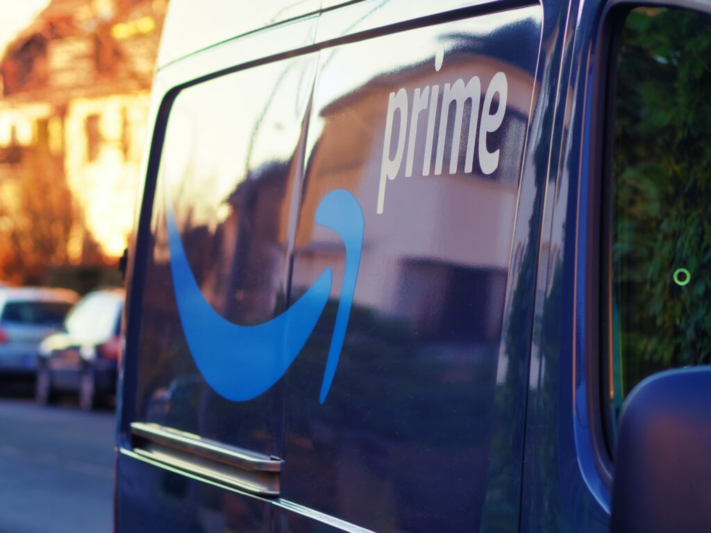 Amazon Prime logo on a delivery van