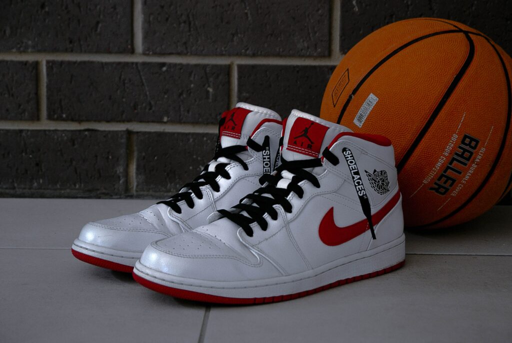 Nike Air Jordan 1's in metallic white and red