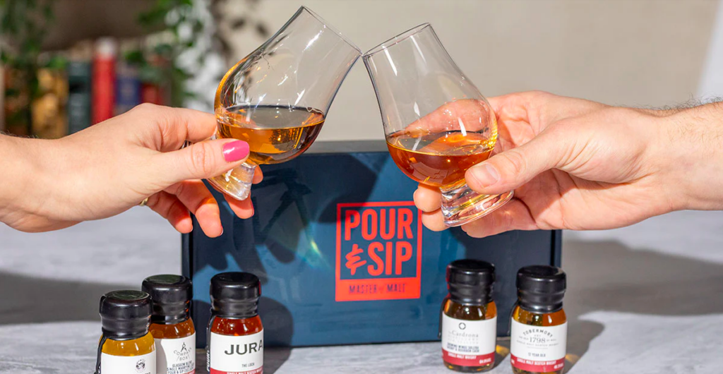 Pour & Sip powered by master of malt. Male and Female toasting with a whisky in hand